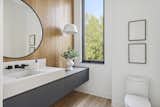 Bath Room, Vessel Sink, Track Lighting, Ceiling Lighting, Medium Hardwood Floor, and Accent Lighting  Photo 5 of 21 in Mississippi River Valley Residence by Sustainable 9 Design + Build