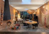 Living space w/Ball of Fire -furniture designed & made by owners - reed chandelier - R.R. clips - natural light