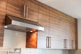 Grain Matched Walnut custom cabinetry, fabricated in the Able and Baker woodshop.