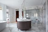 Master Bathroom: 73 (2x3') Calacatta Oro slabs were used to create this floor to ceiling marble bathroom.