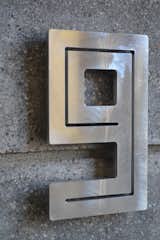 7.5" HIGH X 4.5" WIDE X 3/8" THICK. 

THESE ARE MADE FROM AIRCRAFT GRADE ALUMINUM WITH SHINE, ETCHED, OR BLACK FINISH.

CUSTOM MADE IN THE USA.  Photo 2 of 10 in Architectural Numbers by Shopworks Design Studio