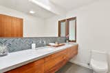 Bath Room, Undermount Sink, Engineered Quartz Counter, Ceramic Tile Floor, Ceiling Lighting, and Wall Lighting Powder room  Photos from Portola Valley