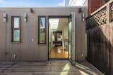 Exterior, House Building Type, Wood Siding Material, and Flat RoofLine Rear facade - folding door  Photo 3 of 18 in Noe Valley home by patrick perez/designpad architecture