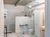 Master bathroom adjacent to the custom built hidden closet with European styled toilets and a large shower space for two, or more.
