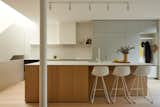 Integration of the opened kitchen and the massive wooden island