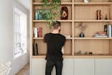 The double living was divided by a freestanding bookcase/multimedia volume