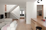 OOpen living space viewing the entrance two steps higher