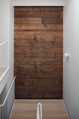 Existing lumber wall bring texture to the house