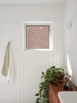 Main bathroom punch window cerating a living  "tableau"