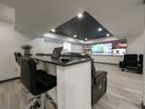 A fabulous high-tech finished basement renovation in Brampton, Ontario.
