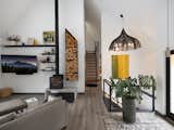 Living room, stairs to basement and stairs to loft/office