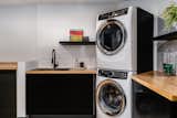 Laundry with folding and hanging drying station