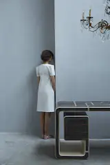 components: ebony, maple wood, leather

Among the pieces of the collection, this is the one that best conjures up the space of an office or, generally speaking, the time and place of work. Designed as an eccentric but elegant and functional desk, it is named after the city where it was made. The Italian city of Turin shines through the lines that are reminiscent of  the dense weave of a metropolis while the contrast of wood colours is a tribute to Turin's imperial architecture. 
