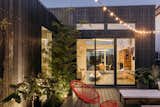 Outdoor, Large Patio, Porch, Deck, Landscape Lighting, Decking Patio, Porch, Deck, Shrubs, and Back Yard Courtyard  Photo 1 of 26 in Nico's House by Mark A Cuellar, Design+Build
