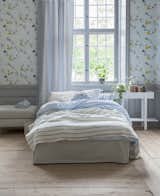 Bemz bedskirt in Sandhamn Stipe, bedspread in Cloud Brera Fino by Designers Guild and curtains in Vreta Gingham.