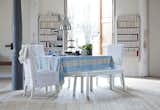 IKEA Henriksdal chairs with Bemz covers in Loose Fit Absolute White Rosendal Linen. Bemz fabric by the metre tablecloth in Lapis Brera Largo. 