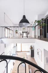 The space is divided into two levels, re-opened in this office renovation.
