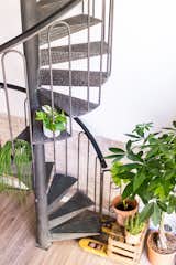 A brand new and beautiful spiral staircase join the two levels in this office.