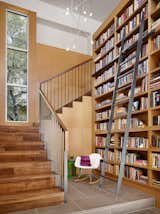 Stair and Library reading nook and custom steel library ladder.