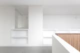 All the furniture in the attic is tailor made to optimise the low ceiling space, to obtain storage spaces .