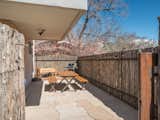 Outdoor, Flowers, Horizontal Fences, Wall, Landscape Lighting, Front Yard, and Large Patio, Porch, Deck  Photo 2 of 37 in One Of A Kind Santa Fe Modern Home by Austin