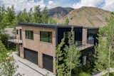 A view of one of the larger townhouses with a view to Saddle Butte in the Town of Jackson beyond