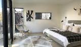 Glazing at the master bedroom creates an indoor-outdoor feeling.