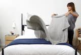 Treat yo’ self in the new year by dry cleaning your favorite Throw and decluttering your bedroom; Source: Nicole LaMotte/Parachute