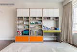 Desk and storage in birch plywood with color accents