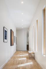 Hallway and Light Hardwood Floor  Photo 7 of 28 in Cat Hill by Studio MM Architect