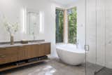 Bath Room, Concrete Floor, Wall Lighting, Recessed Lighting, Freestanding Tub, Ceiling Lighting, Accent Lighting, Corner Shower, Undermount Sink, and Enclosed Shower  Photo 13 of 28 in Cat Hill by Studio MM Architect