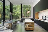 Kitchen, Concrete Floor, Recessed Lighting, Cooktops, Pendant Lighting, Refrigerator, Wall Oven, Range Hood, Dishwasher, and Undermount Sink  Photo 8 of 19 in South Mountain House by Studio MM Architect