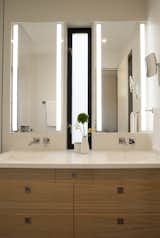 Bathroom vanity with integral Corian counter and sinks