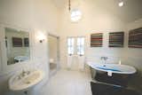 Master bathroom with vaulted ceiling and imported stainless tub create the ultimate bathing experience. 