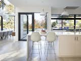 The kitchen overlooks an expansive backyard.