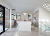 The open kitchen features a generous island for family gathering. 