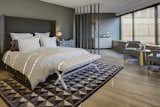 A monochromatic bedroom is soothing and spacious.