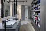 Marble floors connect to hardwood to blend the two functional spaces.