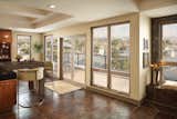 Tuscany Series windows are designed with Milgard's award-winning SmartTouch® Lock. With one hand, lift the locking mechanism to unlock and open the window.