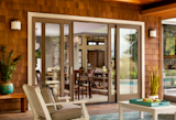 Essence Series sliding patio door. Fiberglass on the exterior and a wood interior you can stain.