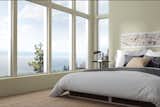 Contemporary and sleek- Aluminum series picture windows featured in a bedroom