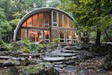 Exterior, Metal Roof Material, Barn Building Type, House Building Type, Shipping Container Building Type, Shed Building Type, Prefab Building Type, Dome RoofLine, Metal Siding Material, Curved RoofLine, and Cabin Building Type Front Facade  Photo 1 of 7 in Q Hut by Coughlin Scheel Architects