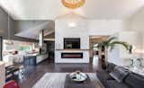 22ft quartz stacked white stone fireplace with an exotic zebra wood mantel. 96” fireplace 