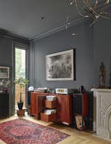 The Living Room features a custom Claro Walnut record cabinet.
