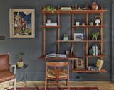 The Living Room features a custom Claro Walnut shelving unit, designed and built by Fernhouse.