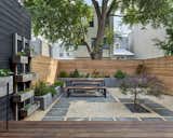A barren and underutilized concrete yard was transformed into a beautiful urban garden.