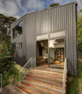 Lower steps and deck extending out from living area