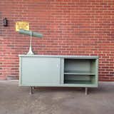 Our loading dock provides a great backdrop for pictures. I scored this steelcase credenza and light at a surplus sale.