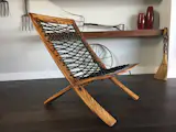Serial #001 of Cat's Cradle, the Les Paul of chairs—soulful, lusty, and purposeful. This chair shown is crafted in Zebrawood. TylersArtChairs.com