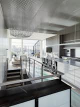Custom panels that matched the cabinetry wrapped the entire media wall and offs of the nearby hallway and powder room